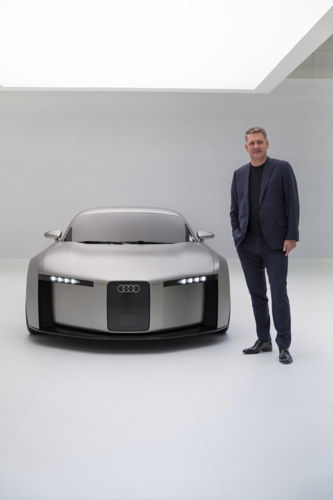 Audi CEO Gernot Döllner to the right of the Audi Concept C